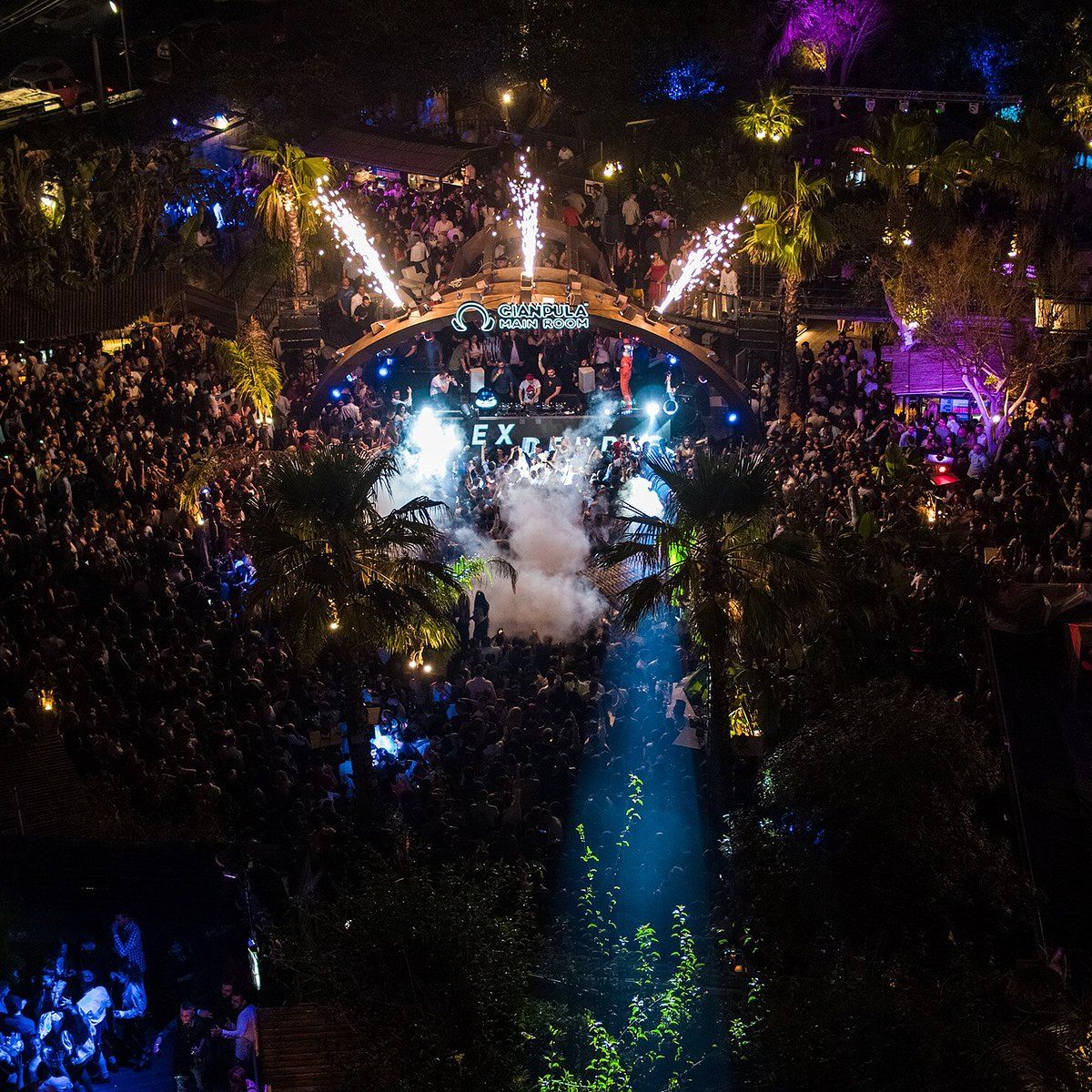 Gianpula Village open-air nightclub in Malta with massive festival crowd